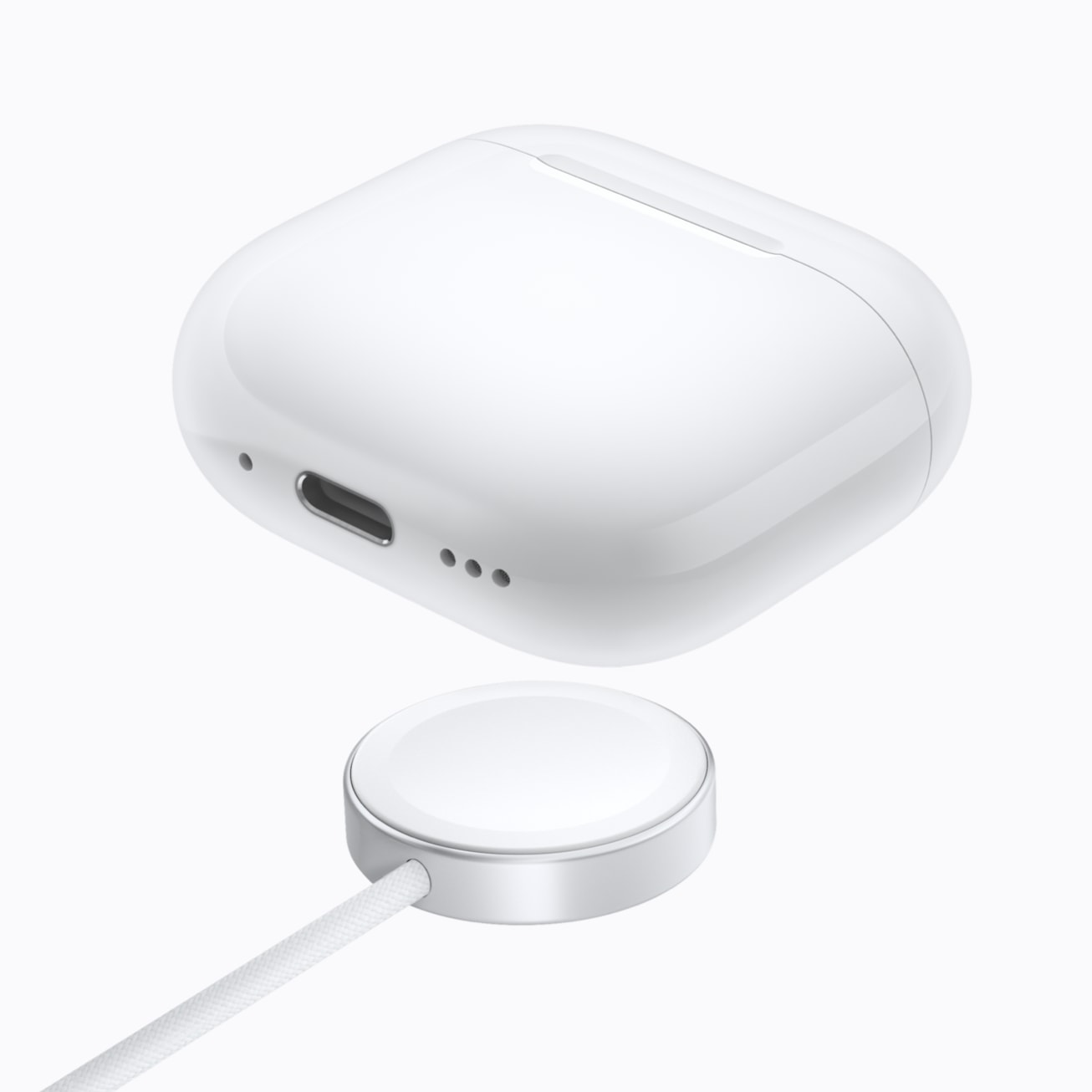 AirPods 5 Wireless Charging Case above a Qi charger