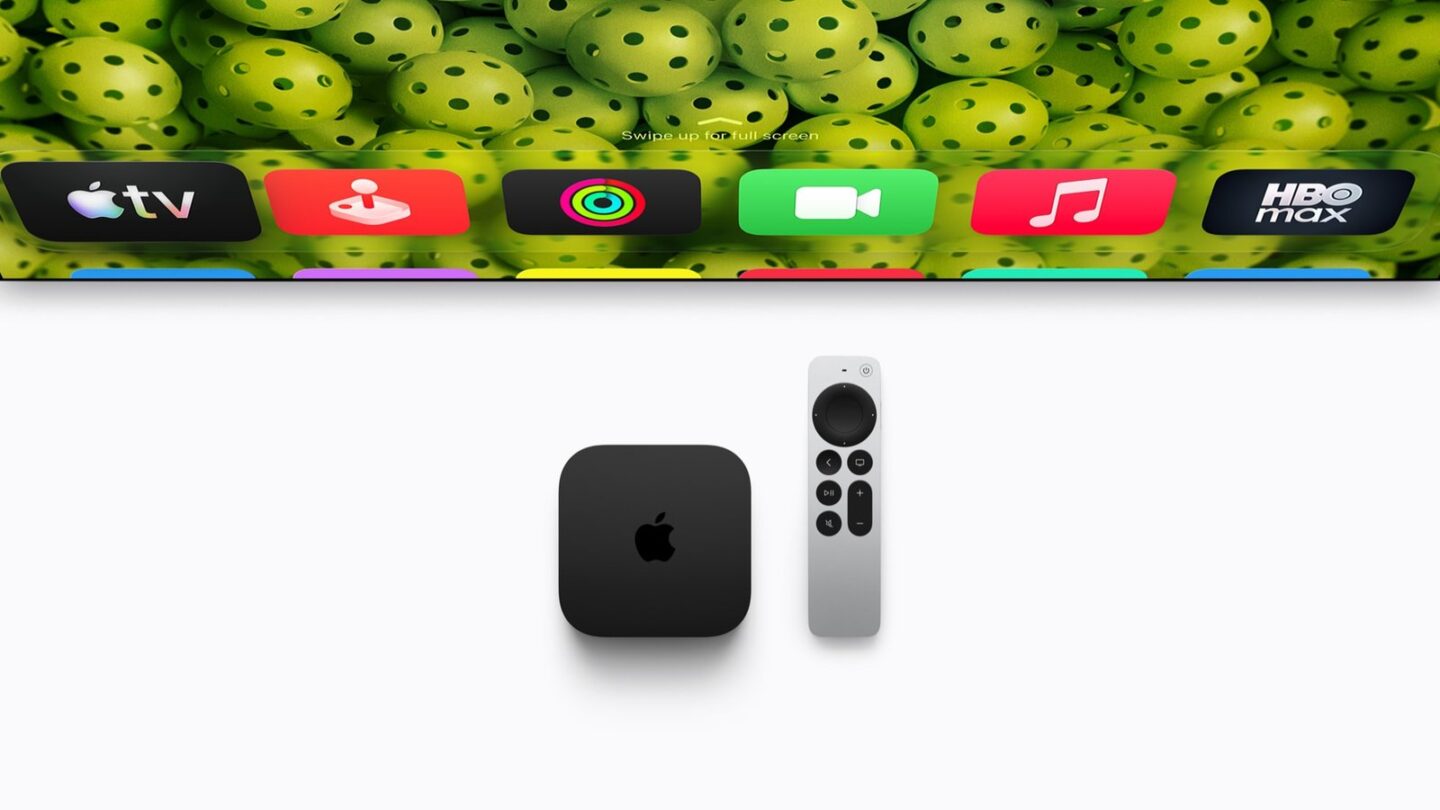 Apple TV 4K box and Siri Remote with tvOS Home Screen on a TV