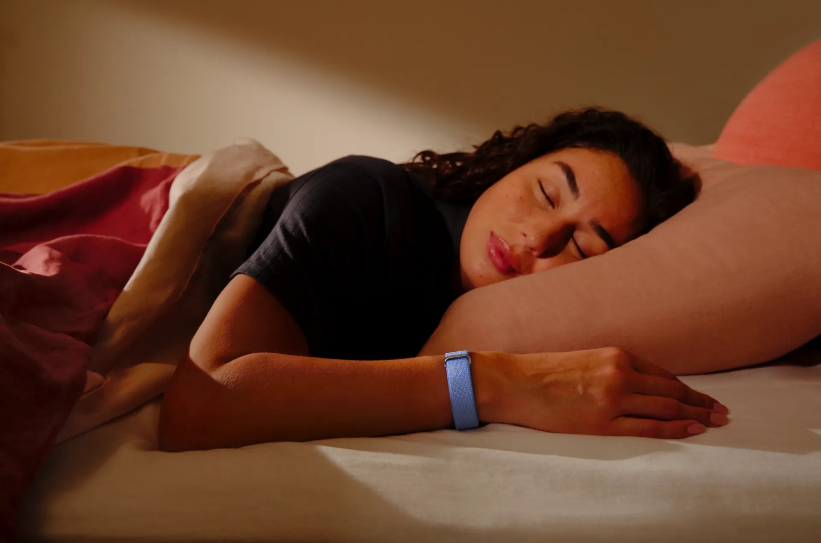 Fitbit Air Lavender band worn overnight for sleep tracking